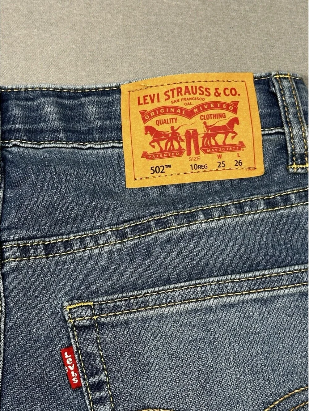 Levi’s 502 Boys 10 Regular Jeans W25 L25 Taper NWOT Medium Wash